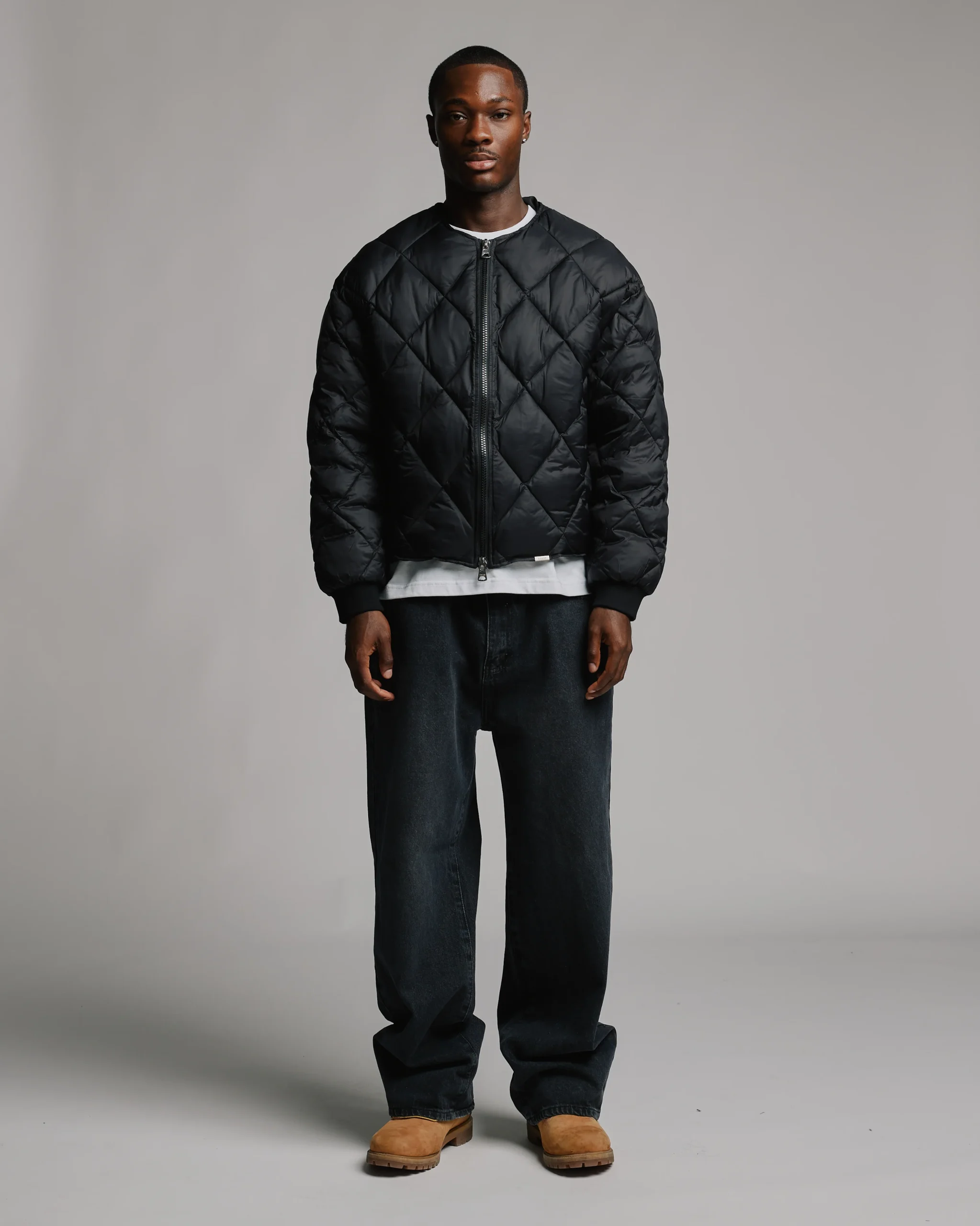 1906-quilted-puffer-jacket-black-11.webp Quilted Puffer Jacket - Black