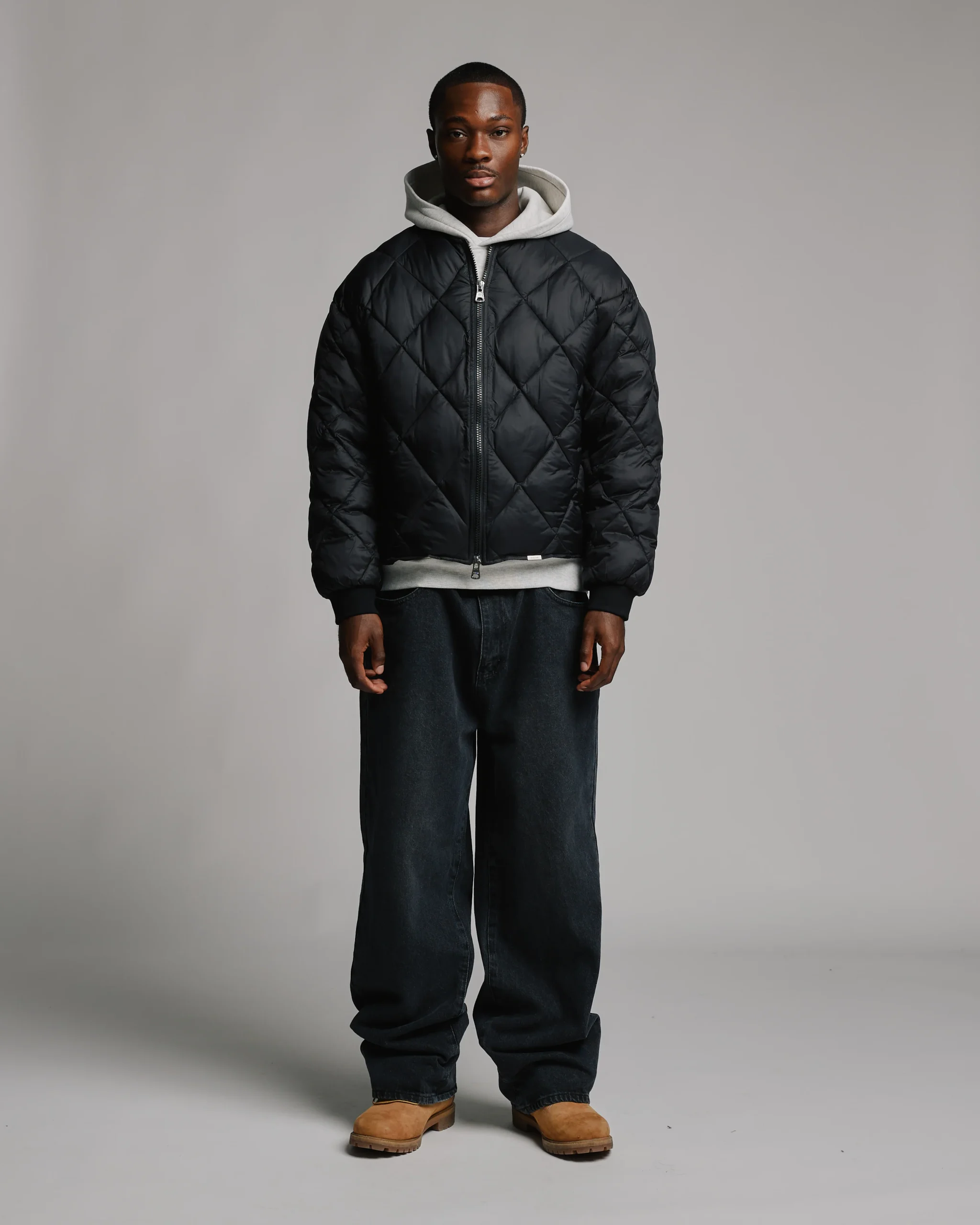 1906-quilted-puffer-jacket-black-2.webp Quilted Puffer Jacket - Black