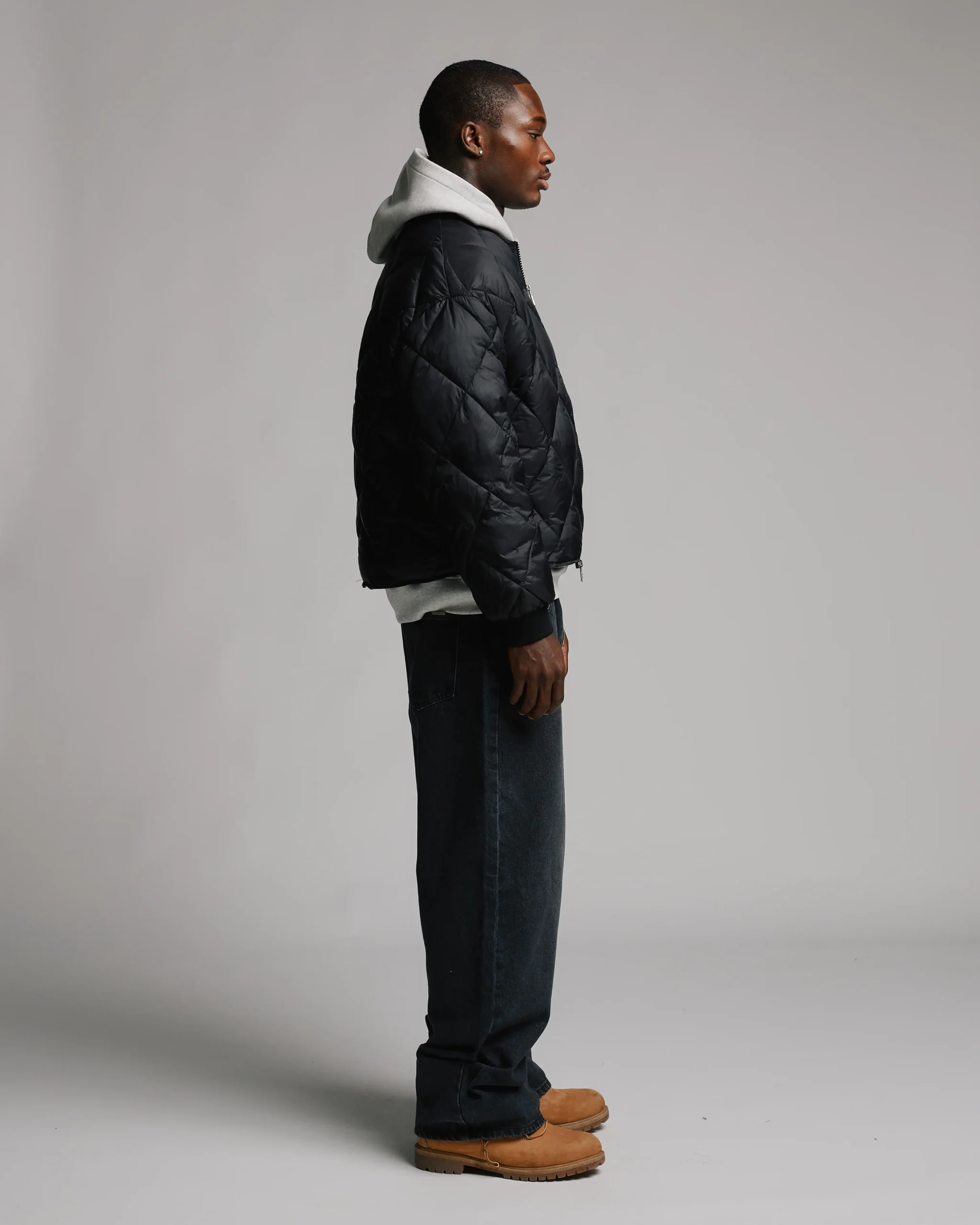 1906-quilted-puffer-jacket-black-4.webp Quilted Puffer Jacket - Black