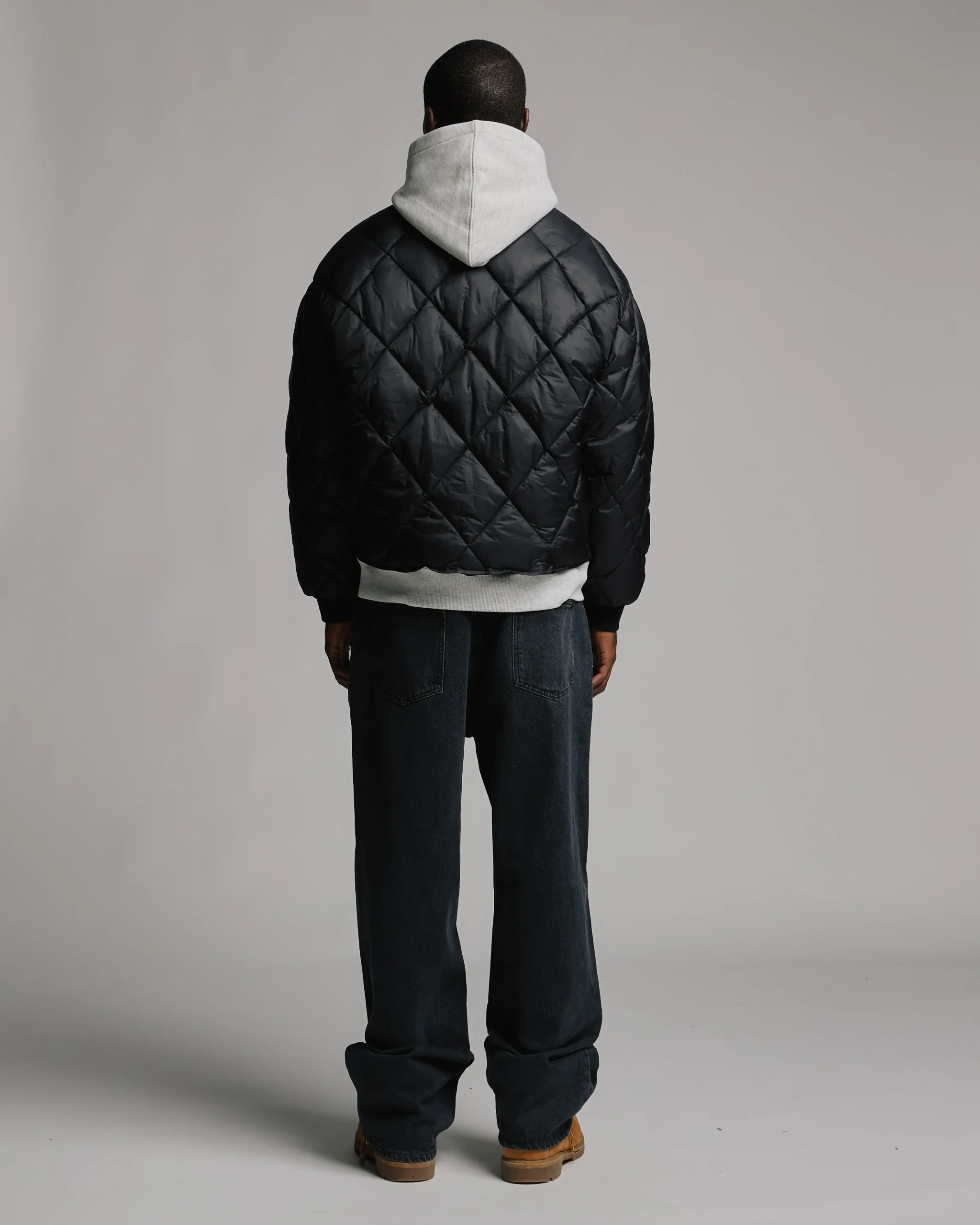 1906-quilted-puffer-jacket-black-5.webp Quilted Puffer Jacket - Black