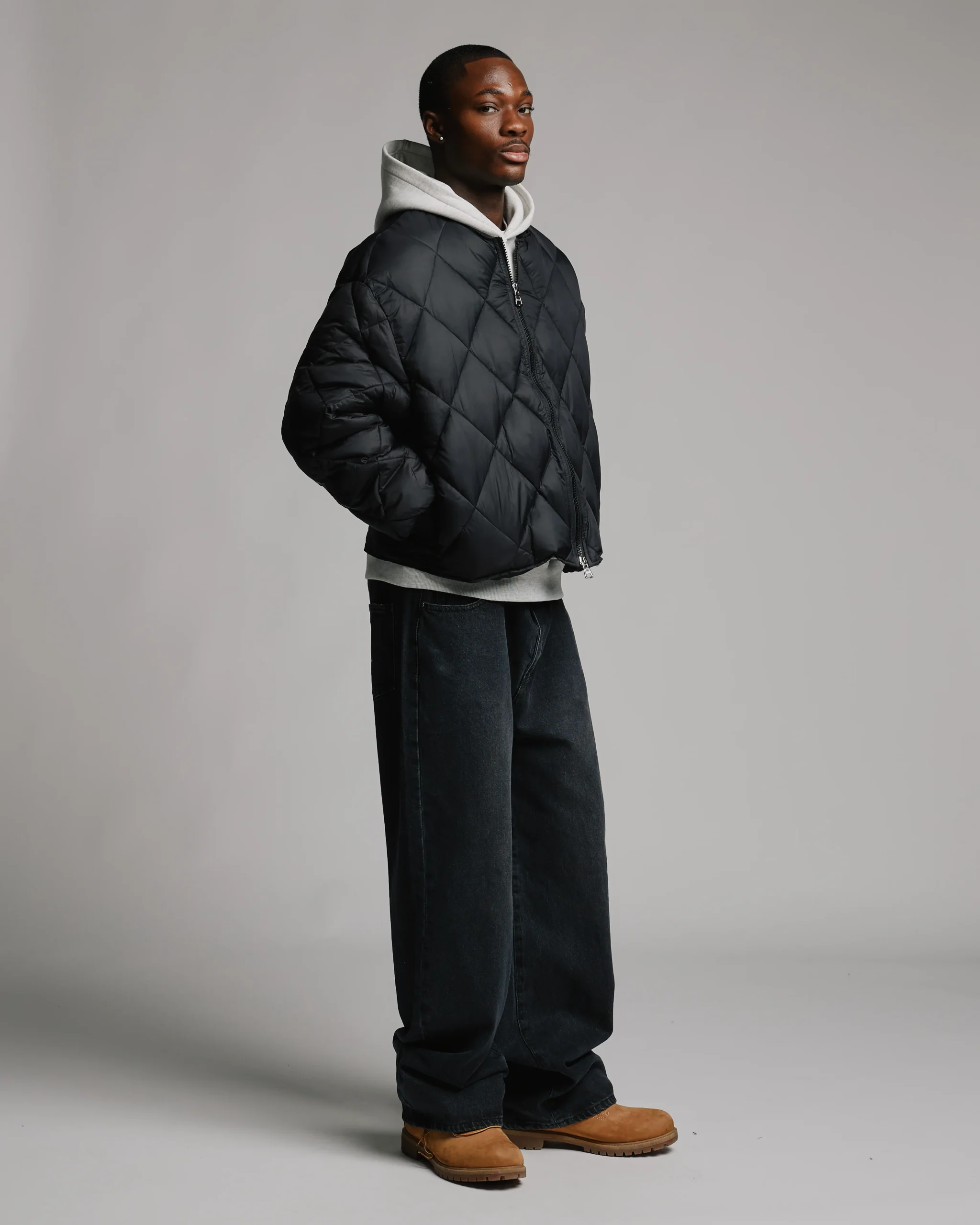 1906-quilted-puffer-jacket-black-6.webp Quilted Puffer Jacket - Black