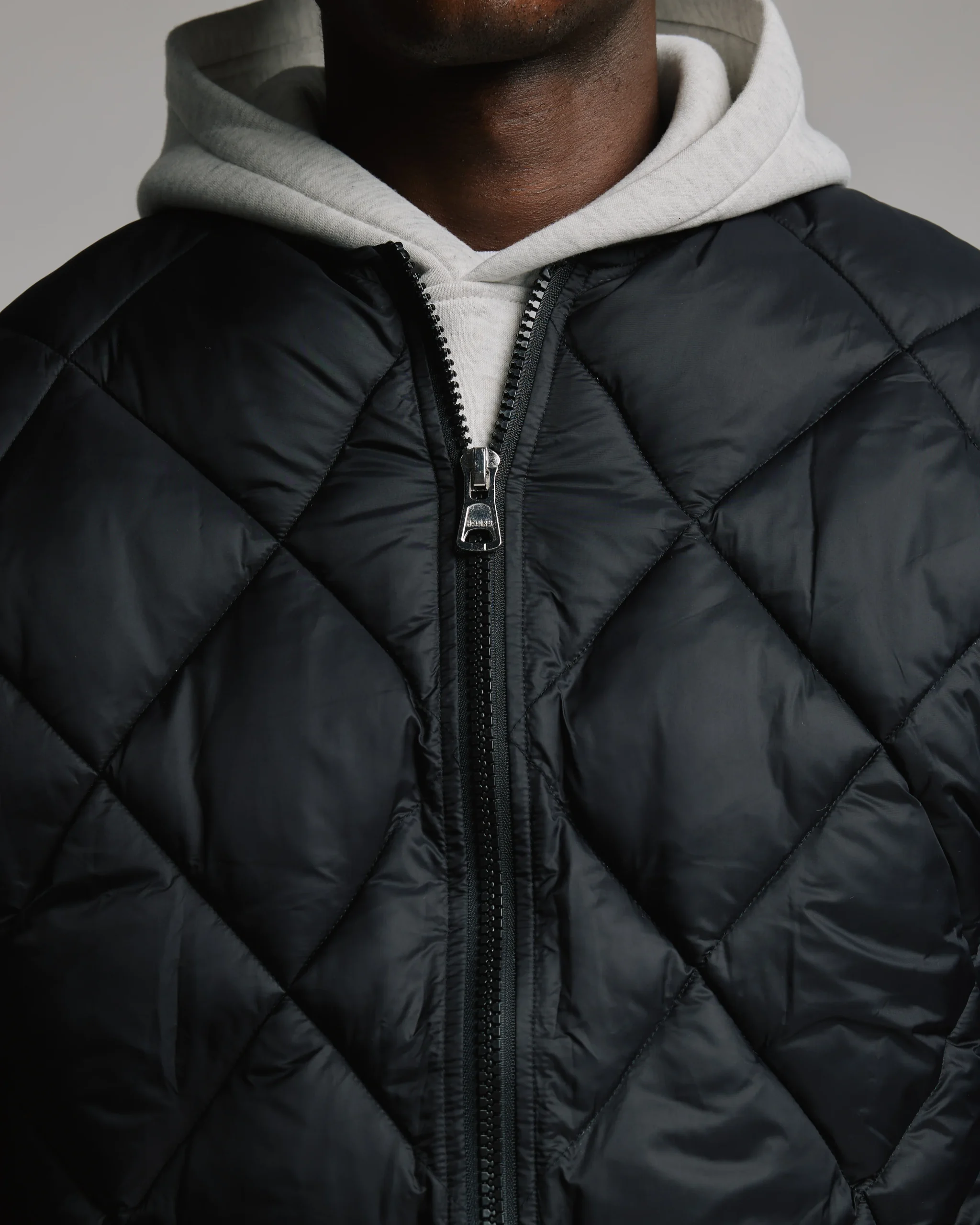 1906-quilted-puffer-jacket-black-9.webp Quilted Puffer Jacket - Black